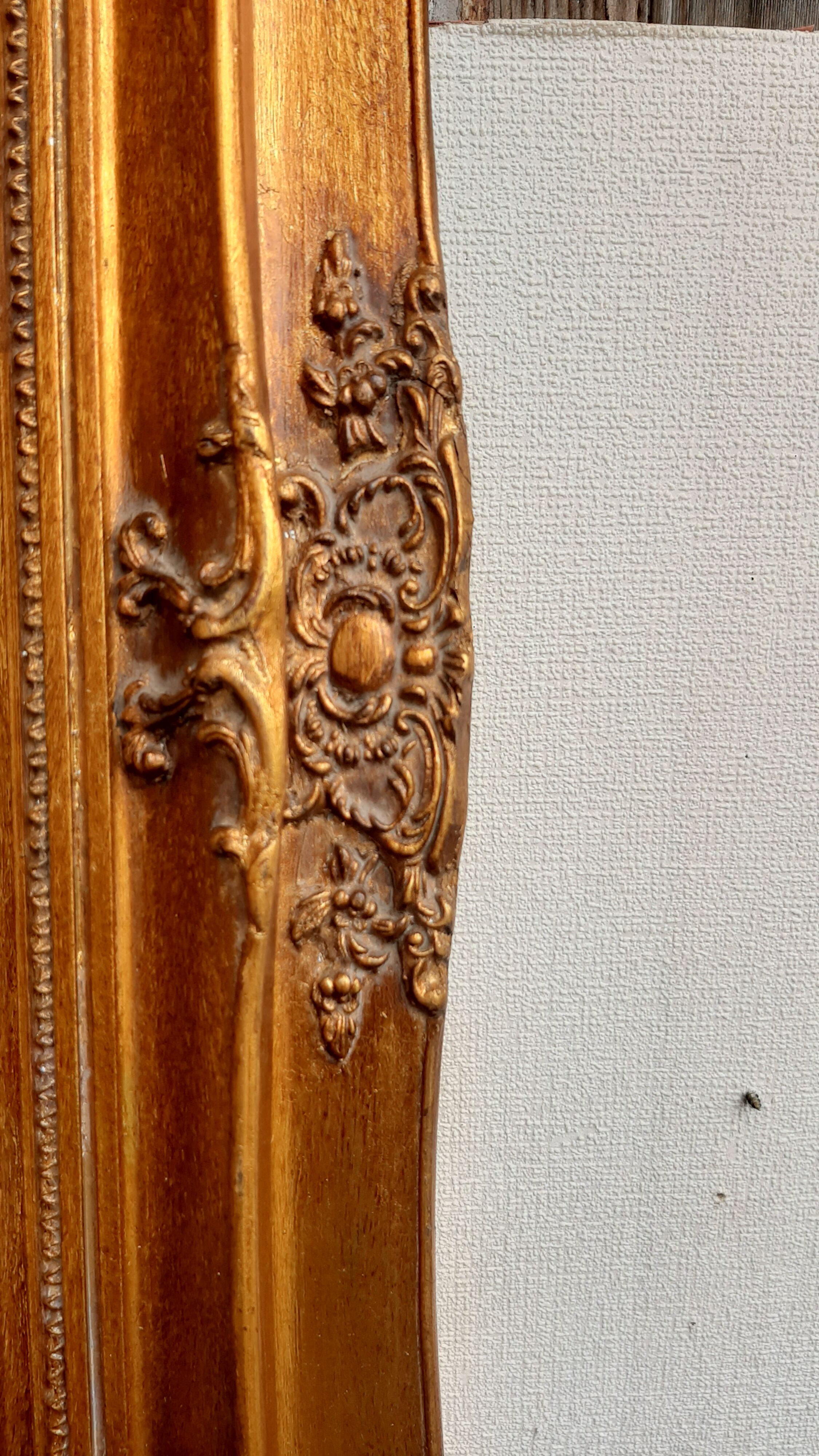 Trumeau miroir  dore biseaute 74 cm x 42 cm decor stuc