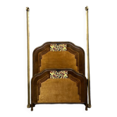Art Nouveau period bed in painted iron faux wood with stylized colored patterns