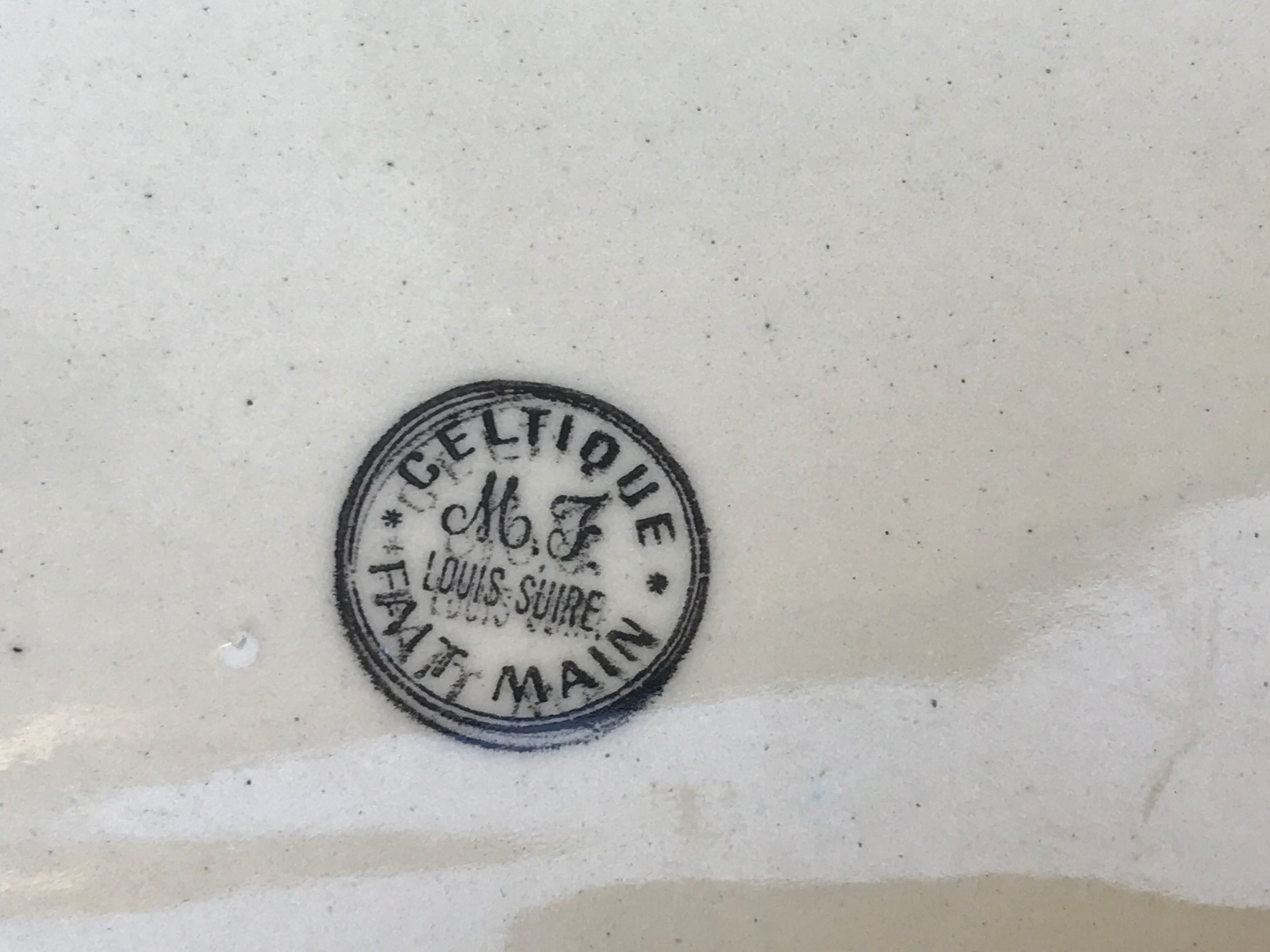 Old faience dish, Scéne Bretonne after Louis Suire and Masse Frères