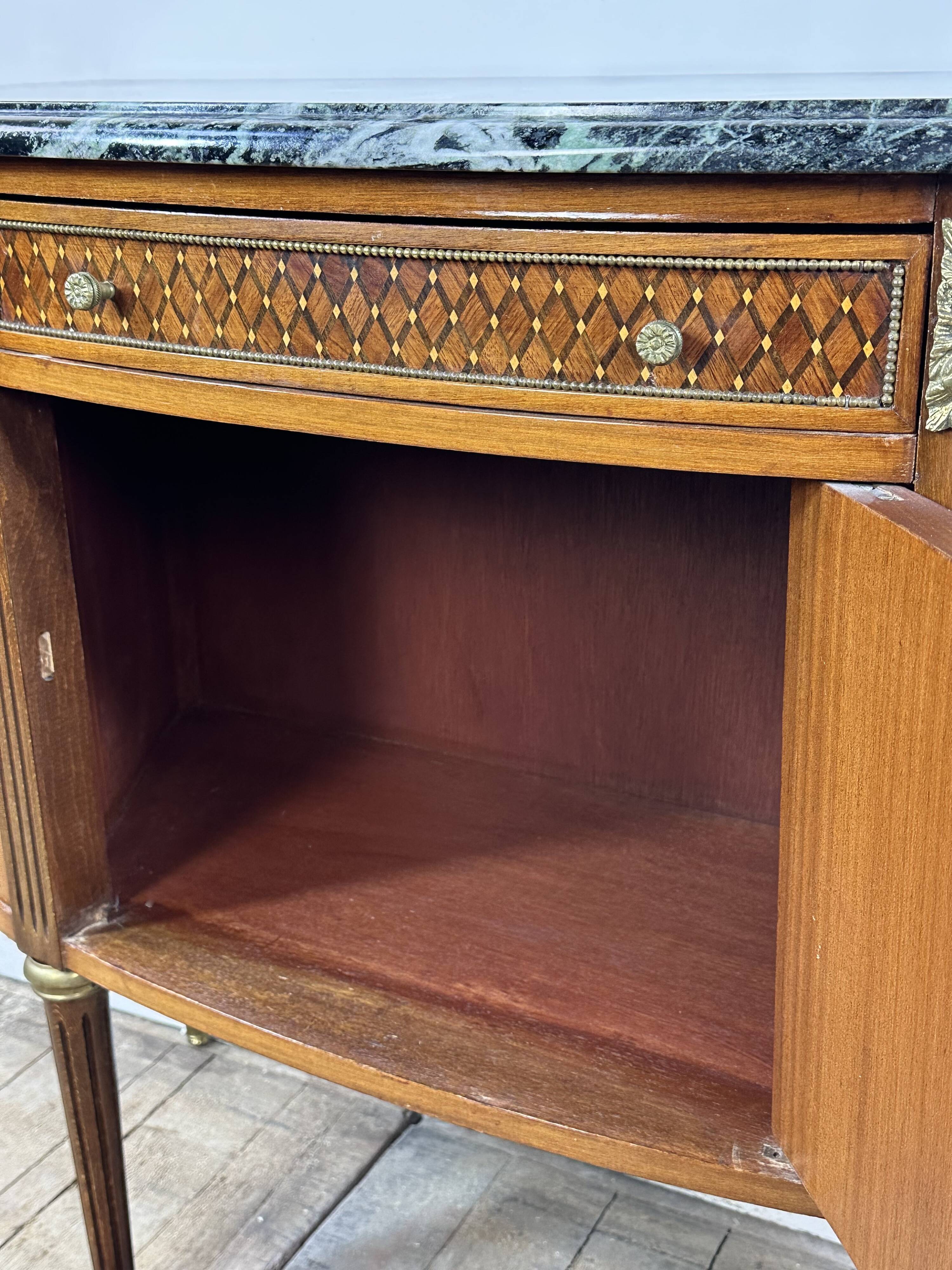 Half-moon commode in the Louis XVI style