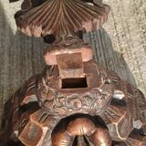 Antique wooden crucifix carved from the Black Forest with grapes and leaves.