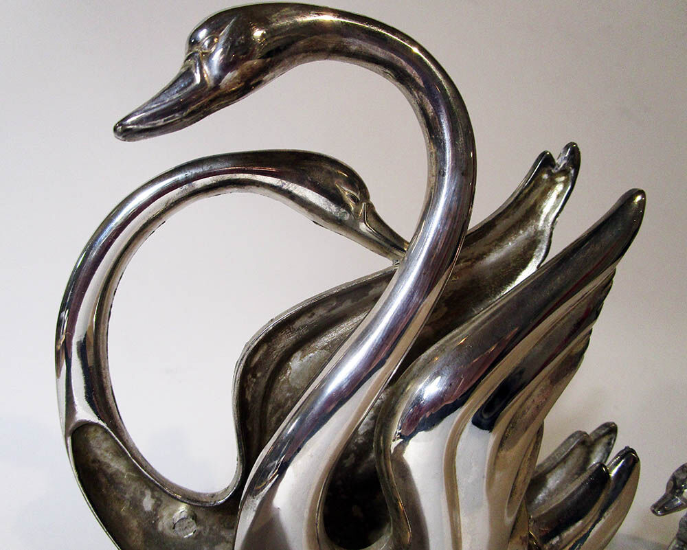 Paper towel holder with swans