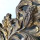 Pediment in blackened wood and 19th century embossed gilded metal foil