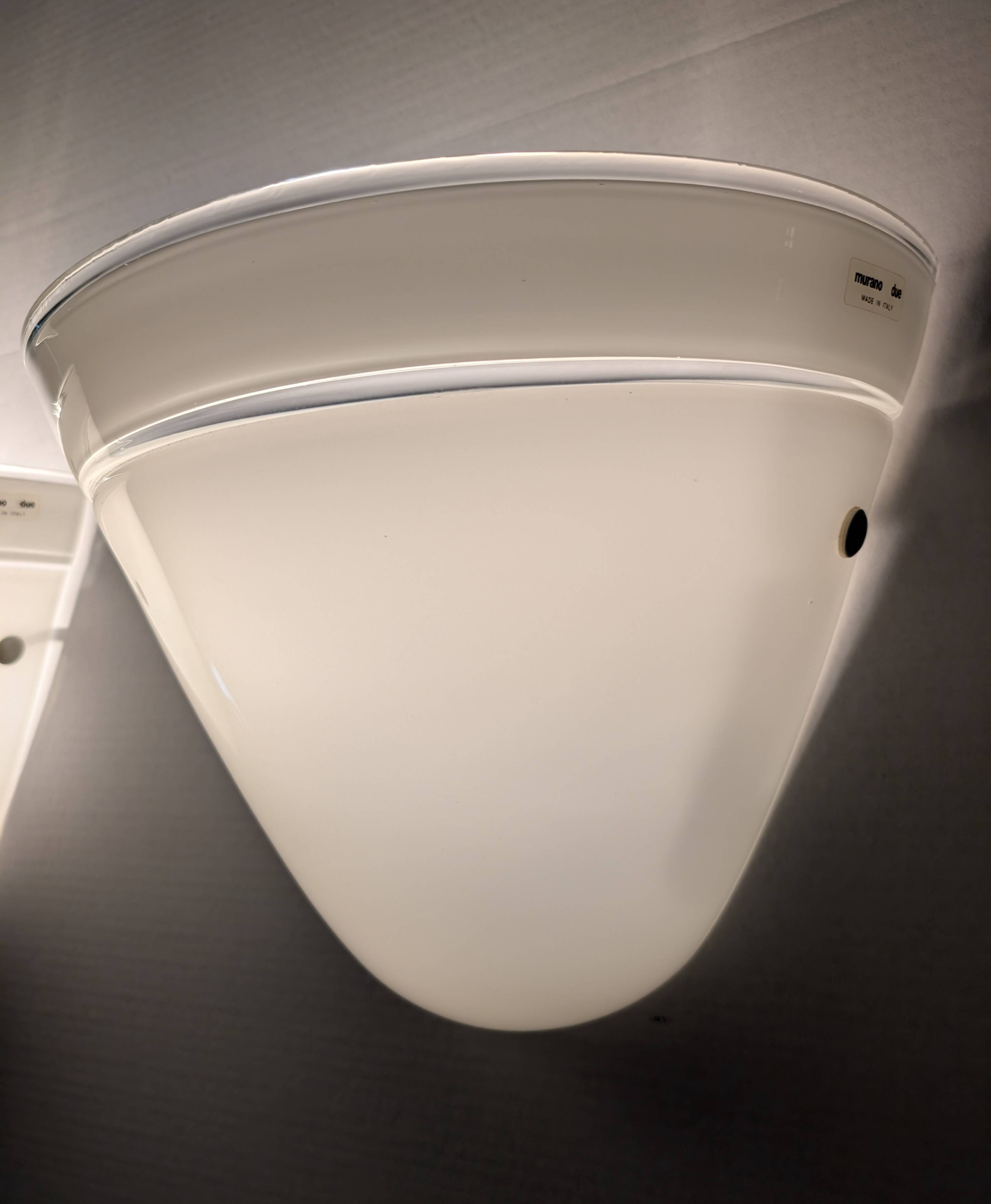 Pair of Murano Due white crystal wall lights, Italy, 1980s