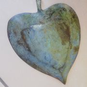 Greenish metal leaf pocket emptier