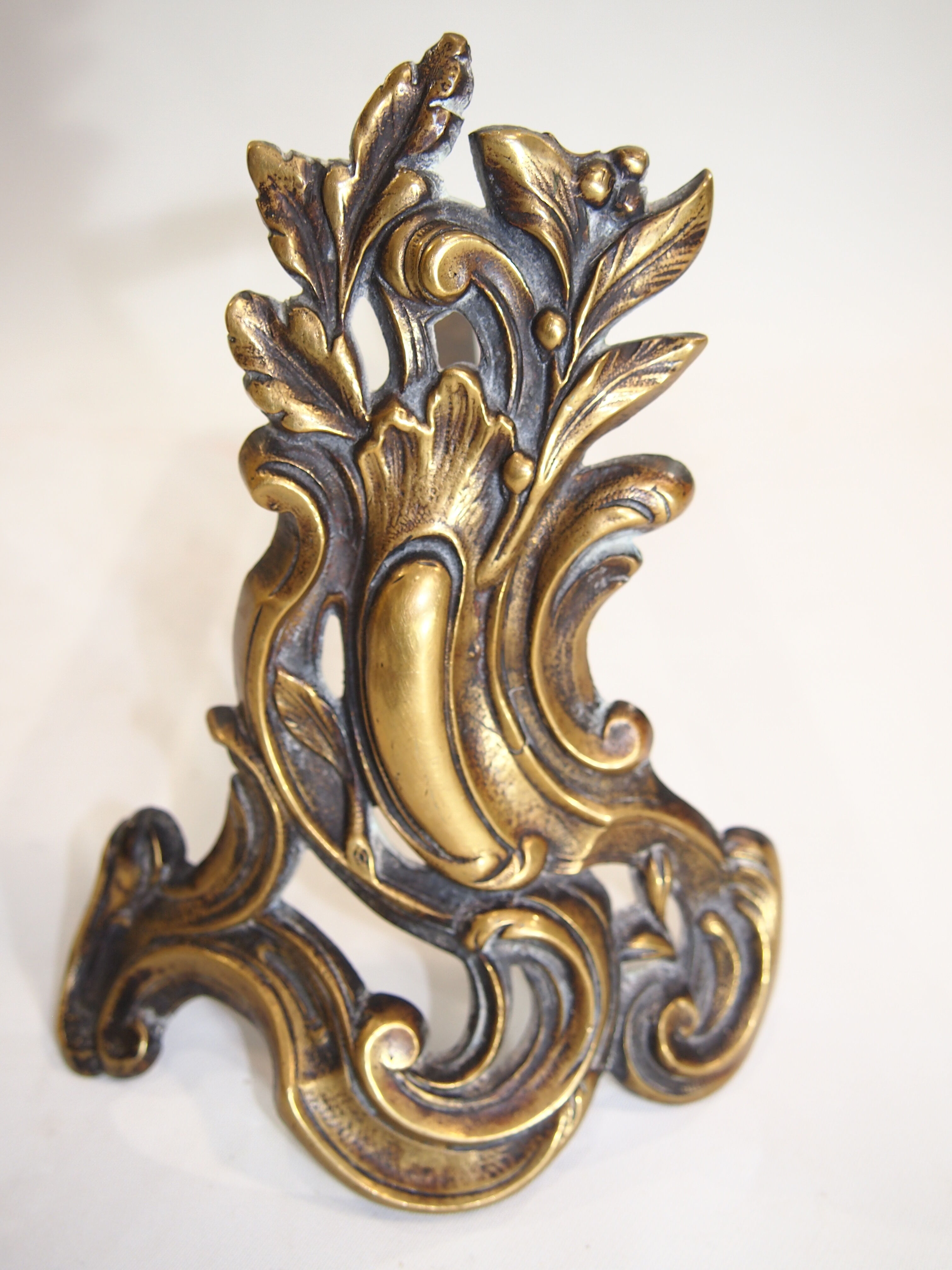 Pair of chimney tracks in bronze