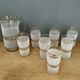 Vintage orangeade service in white granite glass and golden edging