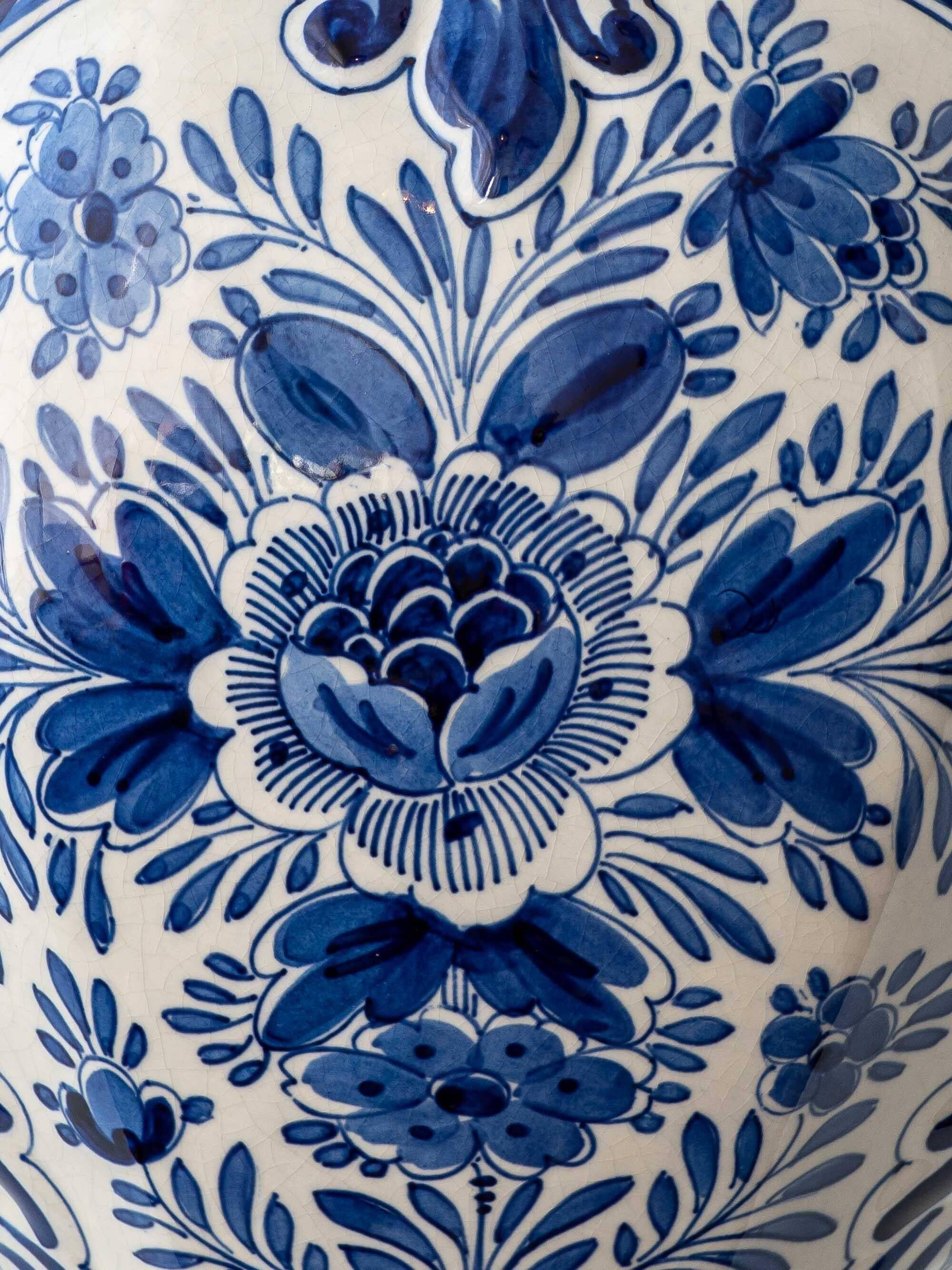 Pair of Royal Delft blue and white ceramic table lamps, 1905, with new pleated silk shades.