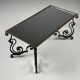 Wrought iron coffee table with mirror glass