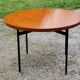Vintage round table in blond mahogany by Gérard Guermonprez Editor Magnani, metal base