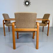 4 armchairs with armrests in beech and fabric, 1970s vintage design.