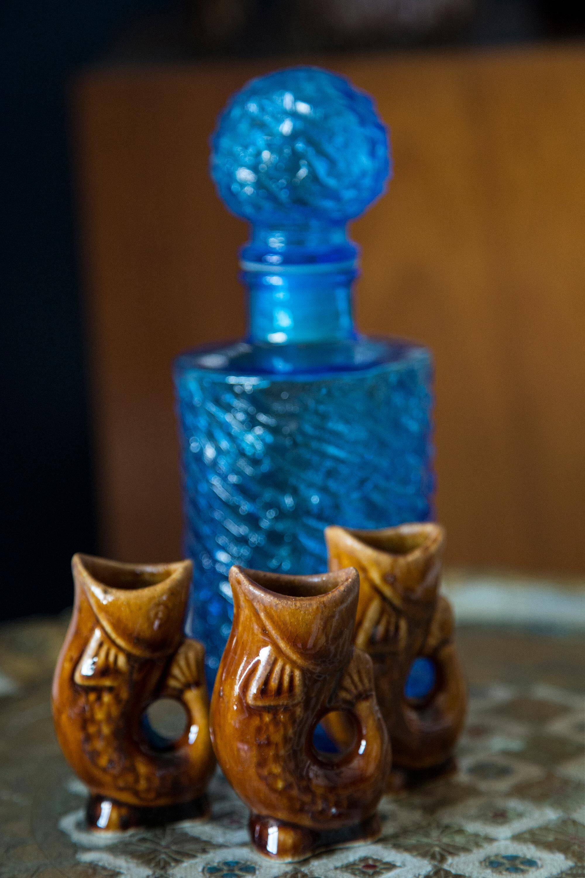Set of three small brown glass fish, 20th century, Europe, 1960s
