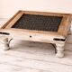 Table basse en bois et acier tressé – Double usage décoratif
