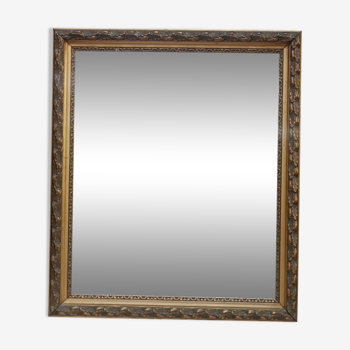 Mirror with gilded carved wooden frame