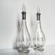 Pair of crystal decanters with solid silver mounts