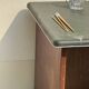Modernist desk in wood and green moleskin upholstery