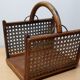 Basket has bamboo cane logs and canning