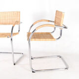 Pair of wicker and metal armchairs