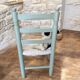 Child's chair in wood and straw revamped in almond green and white.