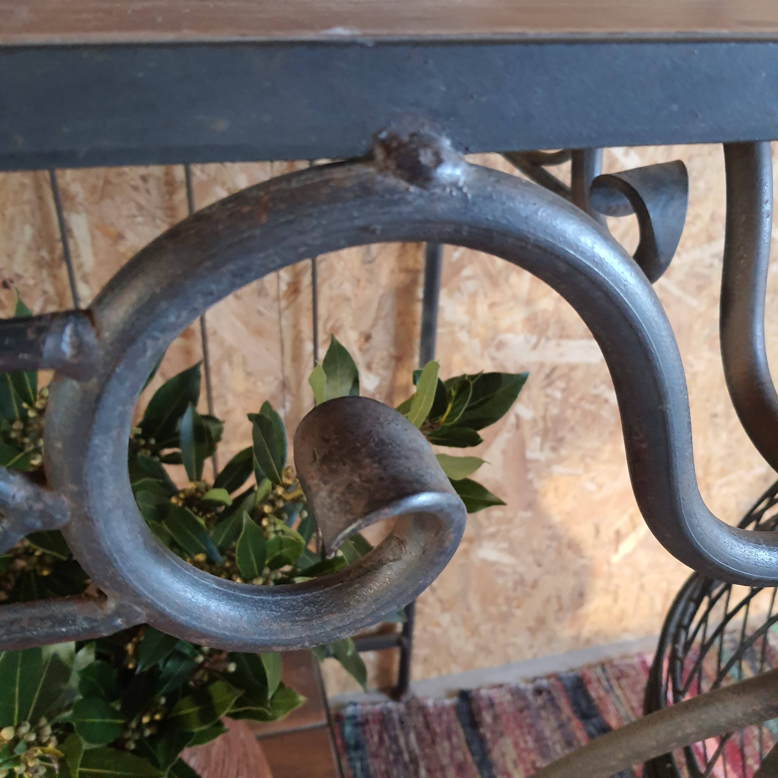 Wrought iron and wood baker shelves