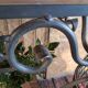 Wrought iron and wood baker shelves