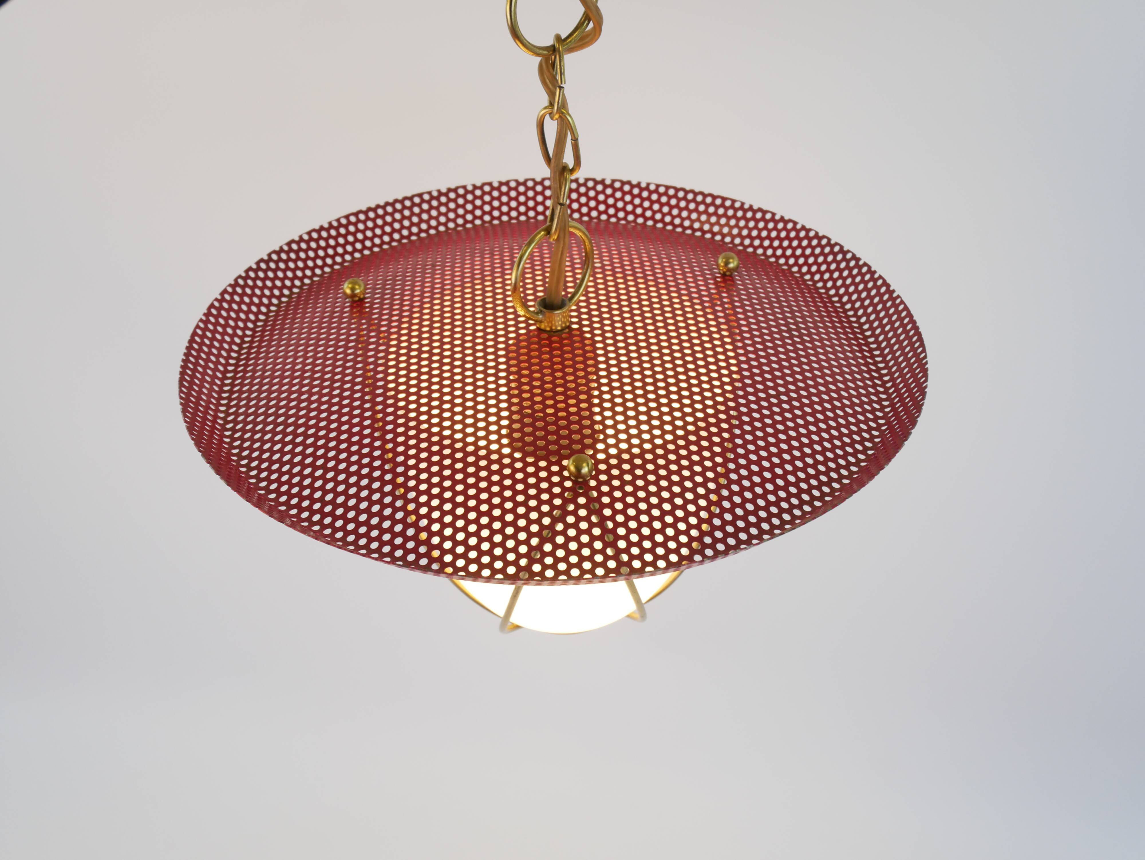 Suspension in perforated red lacquered metal, brass and opaline in the style of Mathieu Matégot