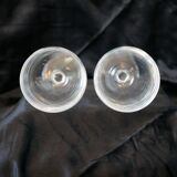 A pair of engraved crystal wine glasses