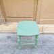 Antique green stool
