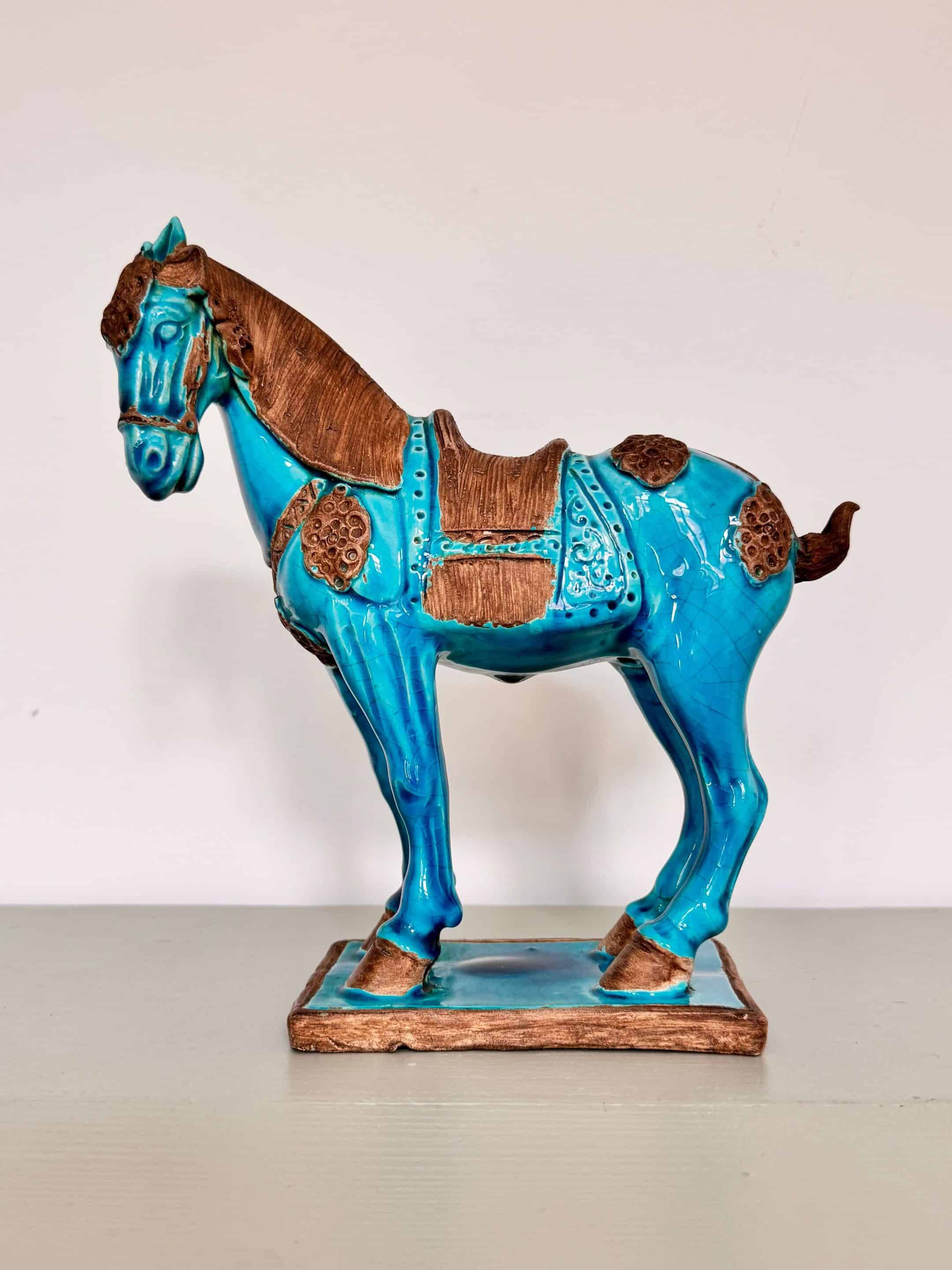 Sculpture of a Tang horse in turquoise blue earthenware