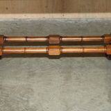 Antique extendable coffee table circa 1880 in solid walnut.