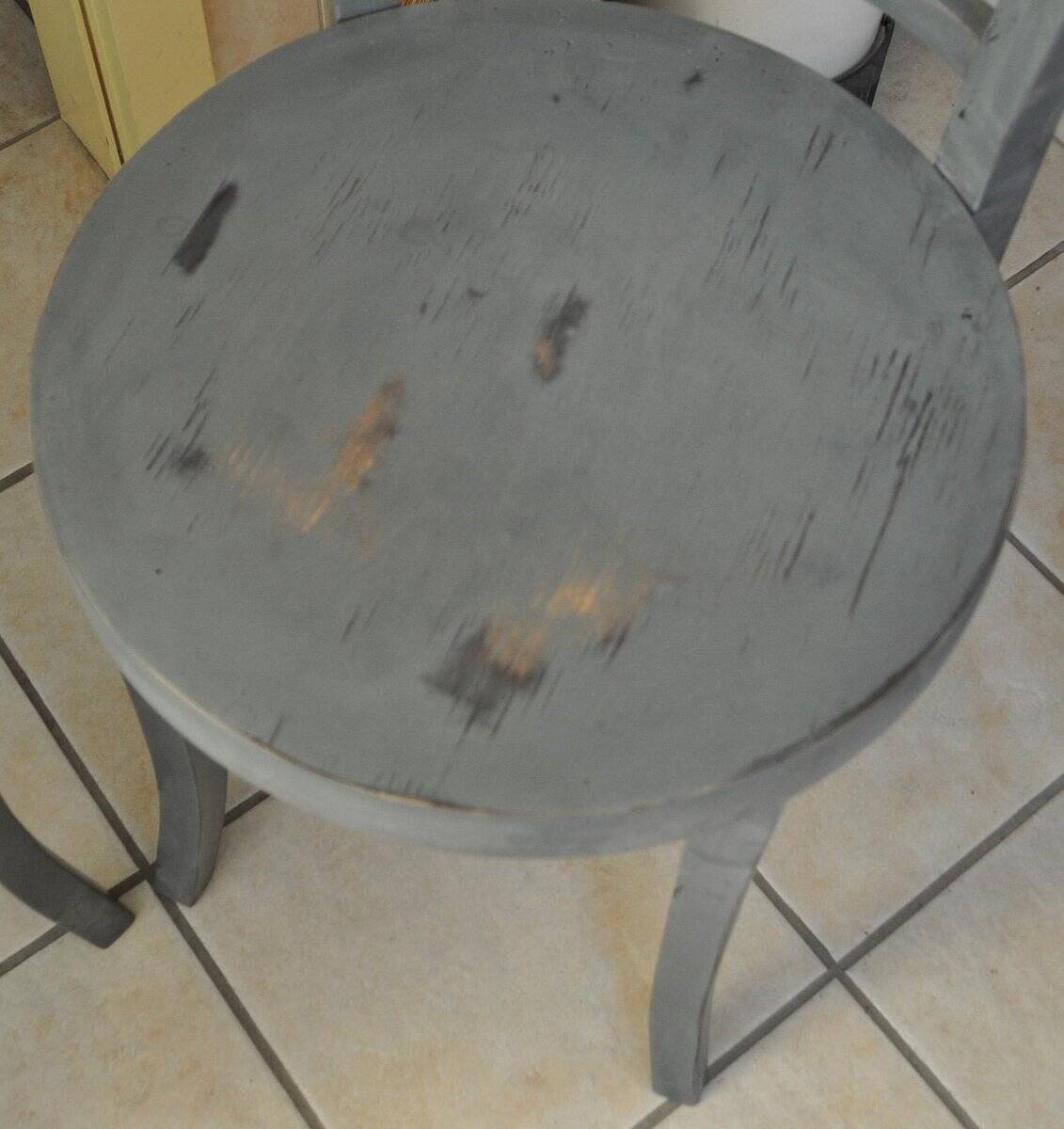 Pair of Thonet bistro chairs from 1930 in painted grey wood, half-moon backrest.