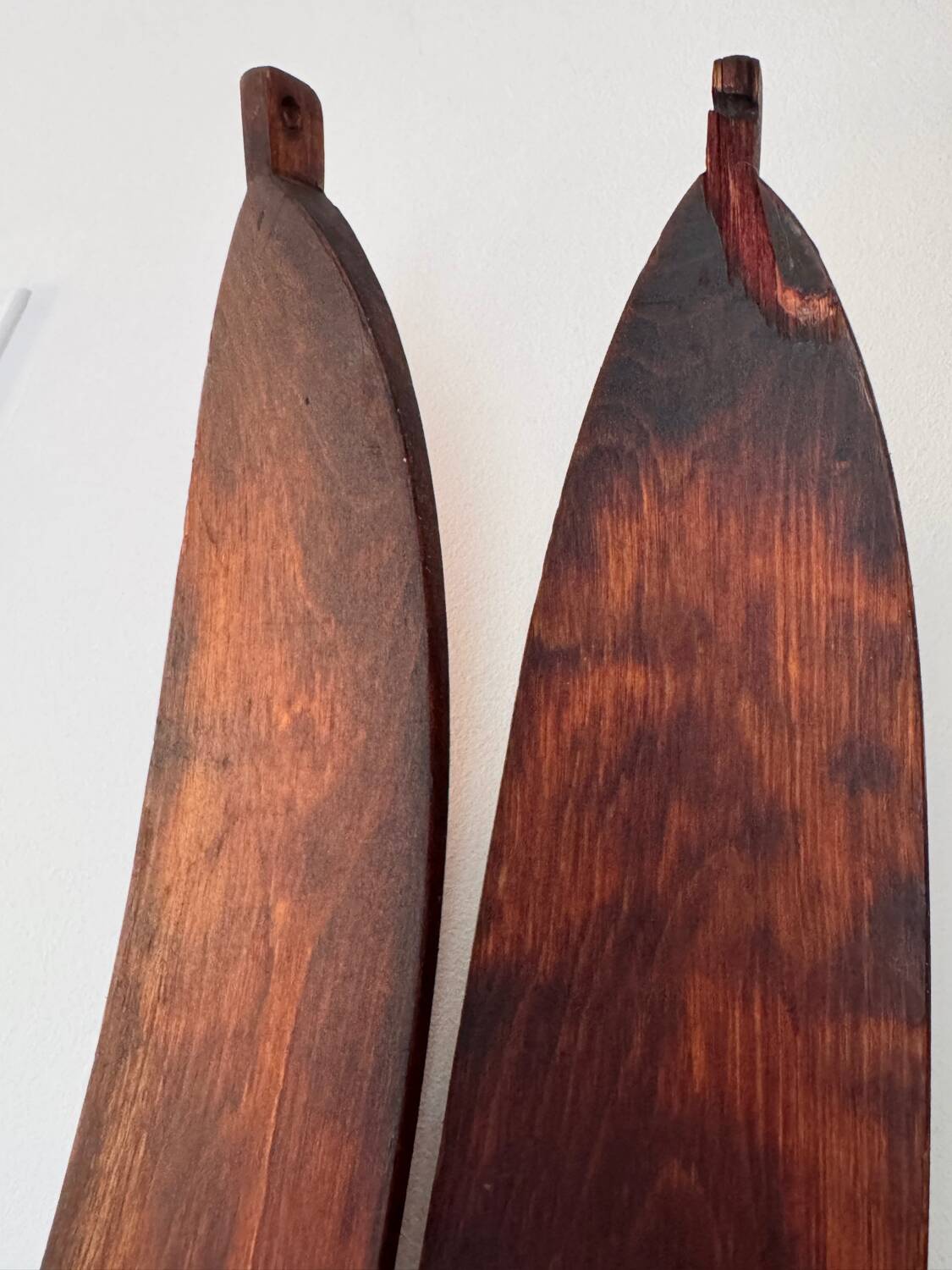 Antique wooden skis with vintage poles
