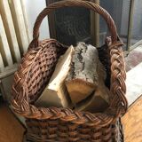 Log basket near fireplace