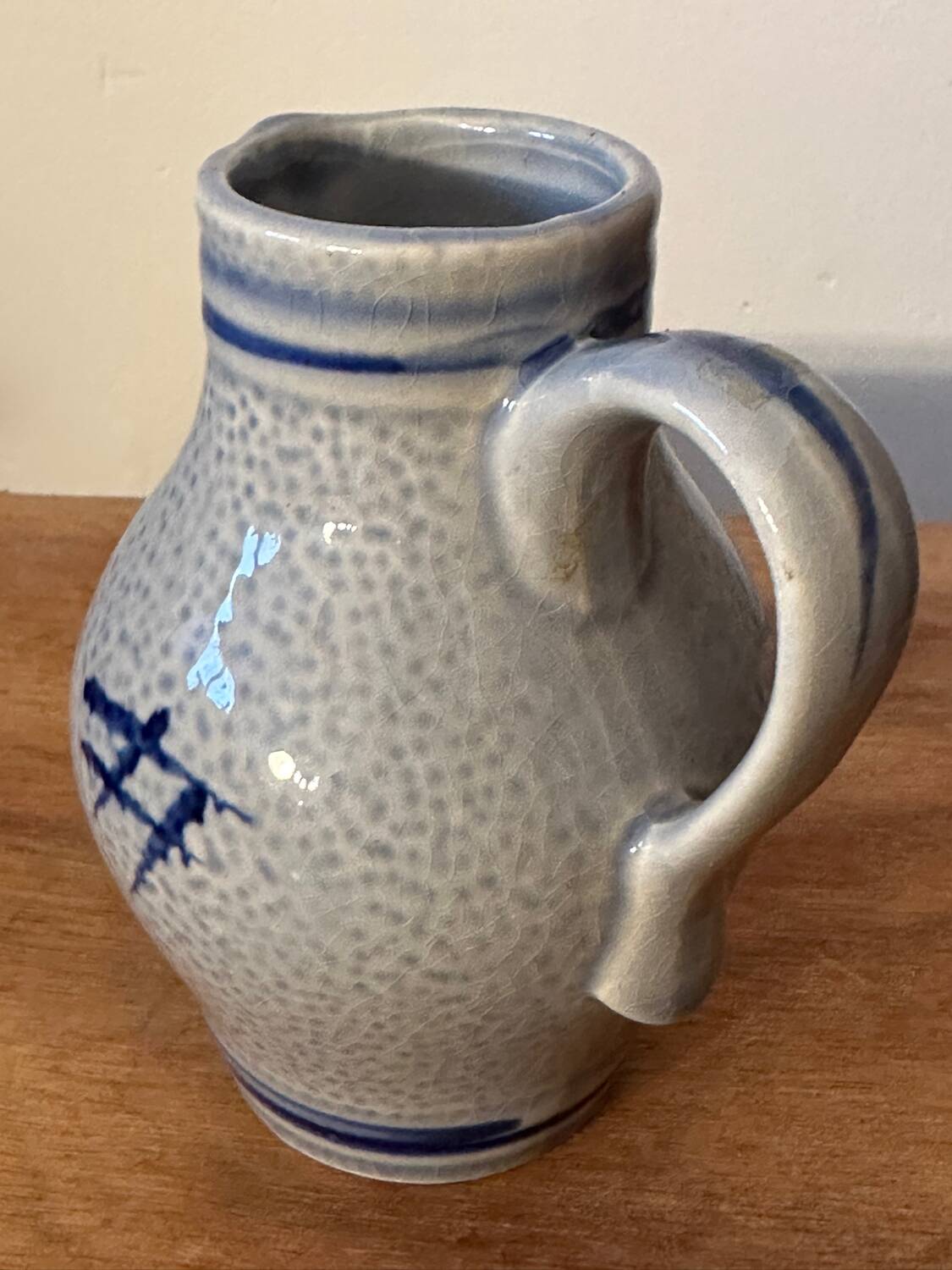 Small stoneware pitcher with salt from Alsace, early 20th century, height 12.5 cm