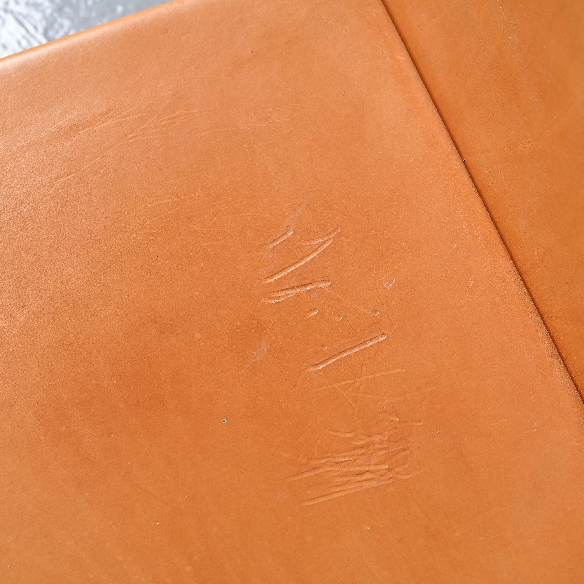 Set of black lacquered wooden chairs with leather, Swiss architect's work, 1980s.