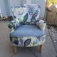 Contemporary ALC frog chair, reupholstered in watercolour floral fabric.