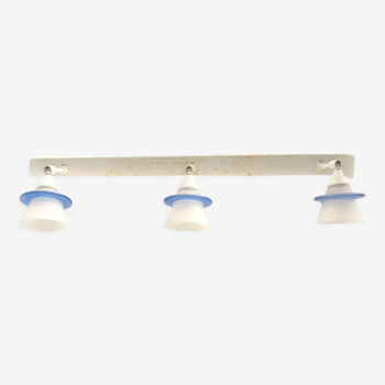 Ramp of 3 vinage opaque white and blue spotlights