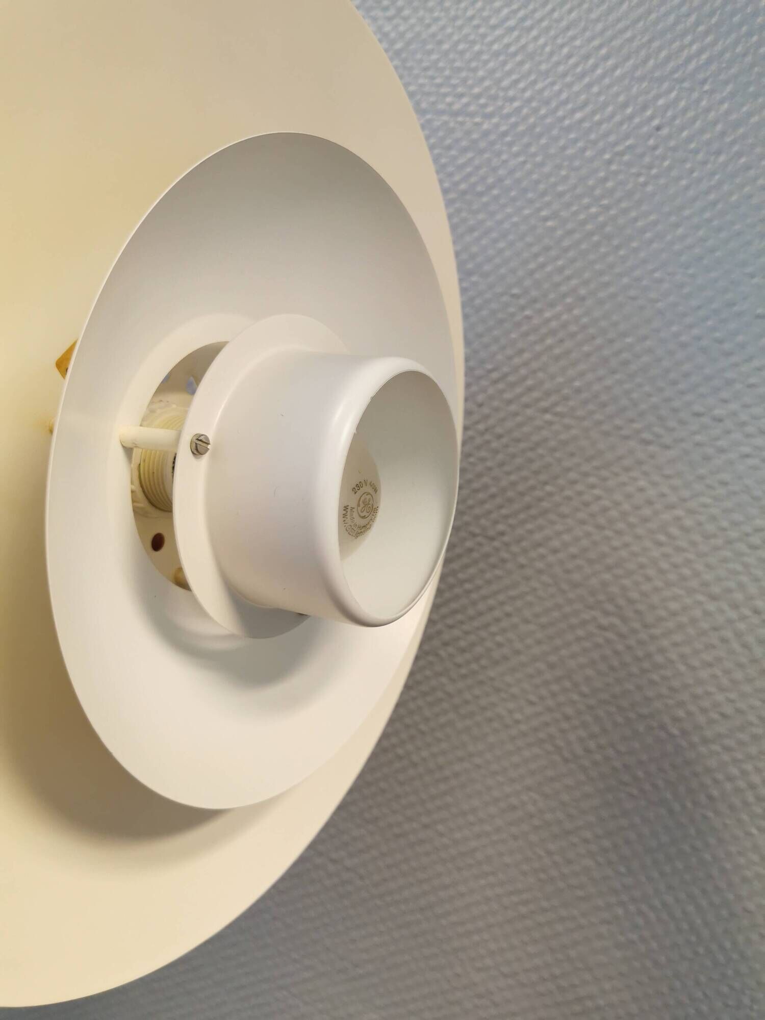 FormLight hanging lamp with multiple layers of shades, a Danish quality product from the 80s.