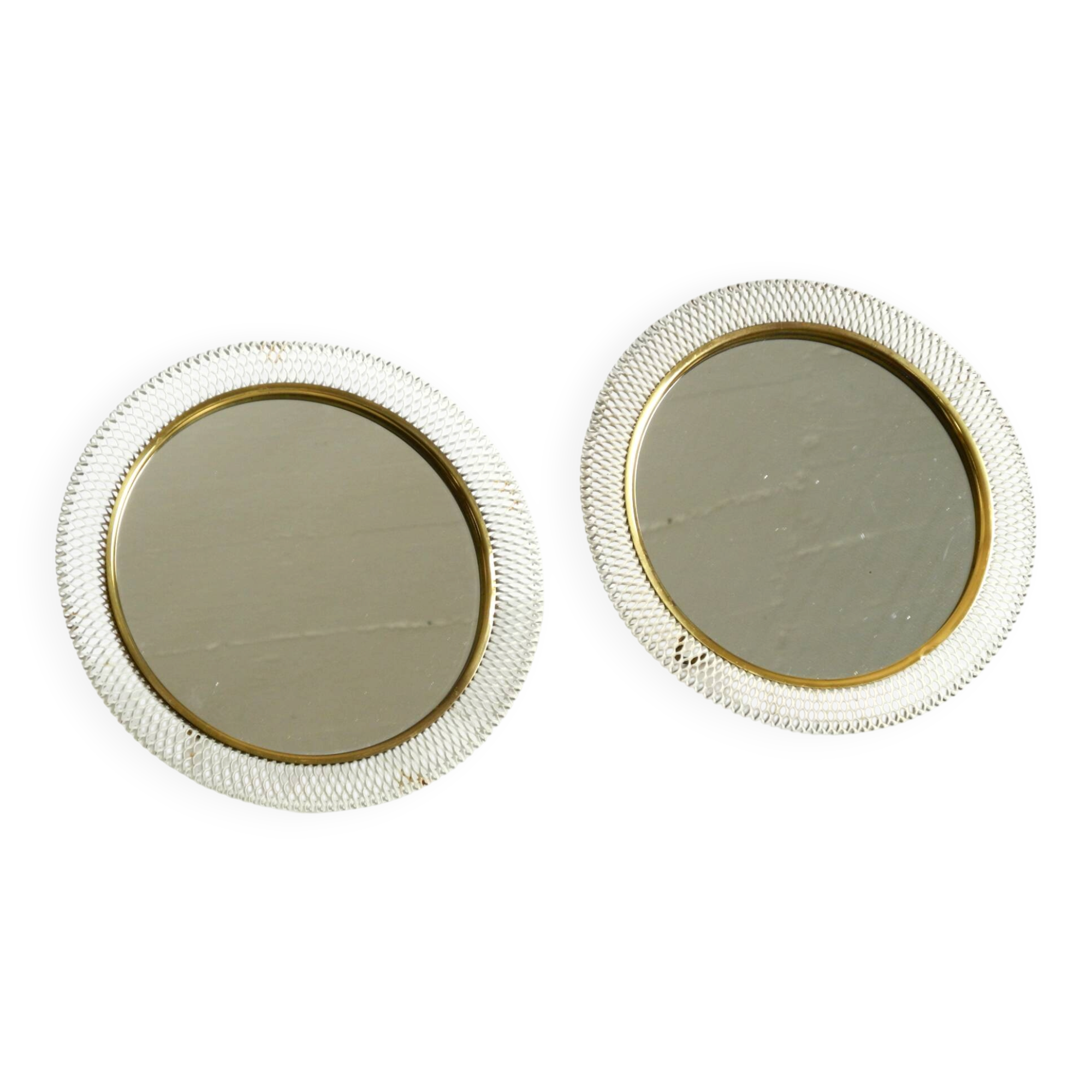Pair of rare small Mid Century Modern table mirrors with expanded metal fra