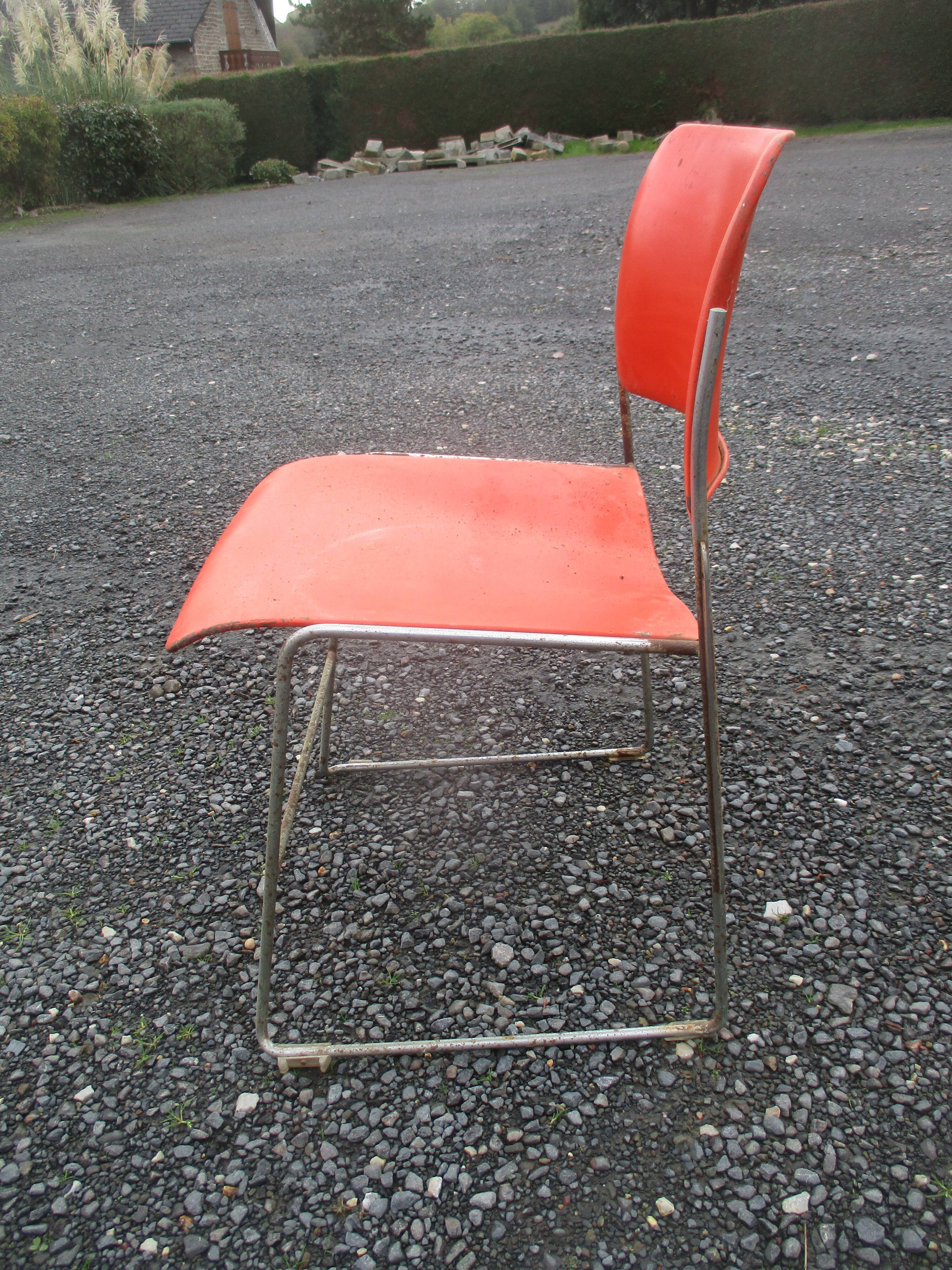 3 iron and plastic chairs