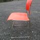 3 iron and plastic chairs