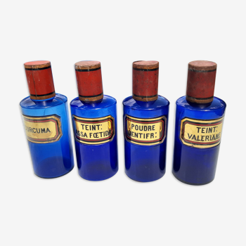 Set de 4 flacons de pharmacie en verre bleu et or