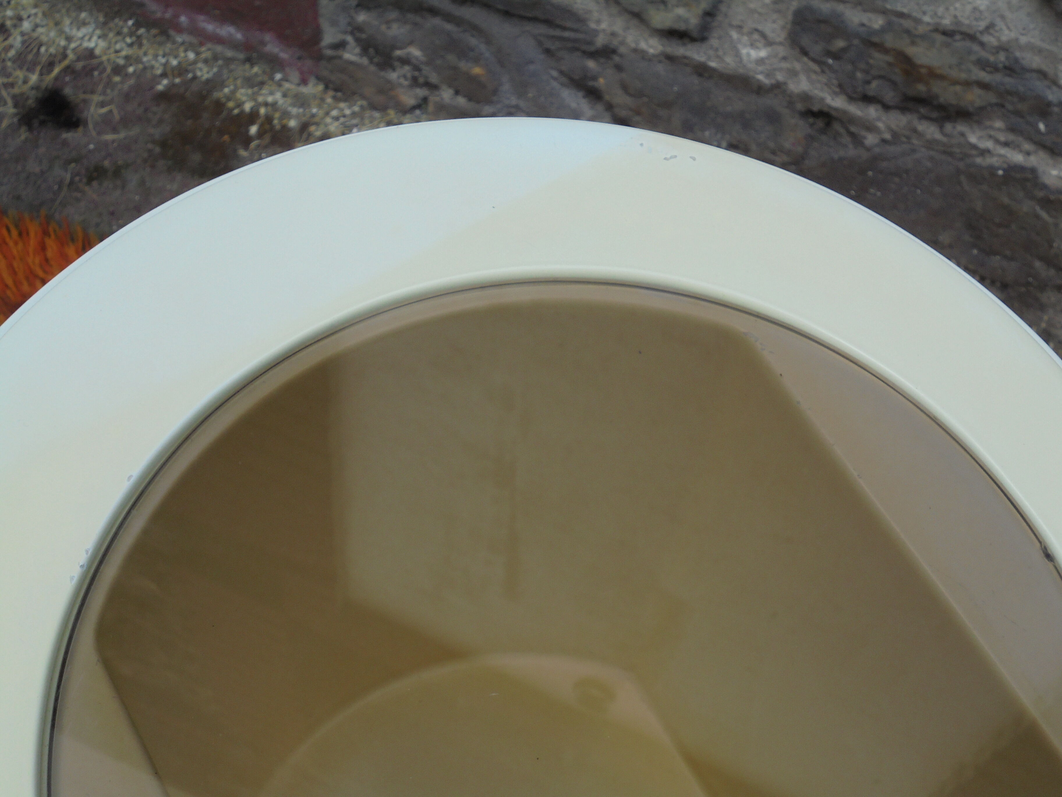 Cylindrical fiberglass bedside table from the 60s