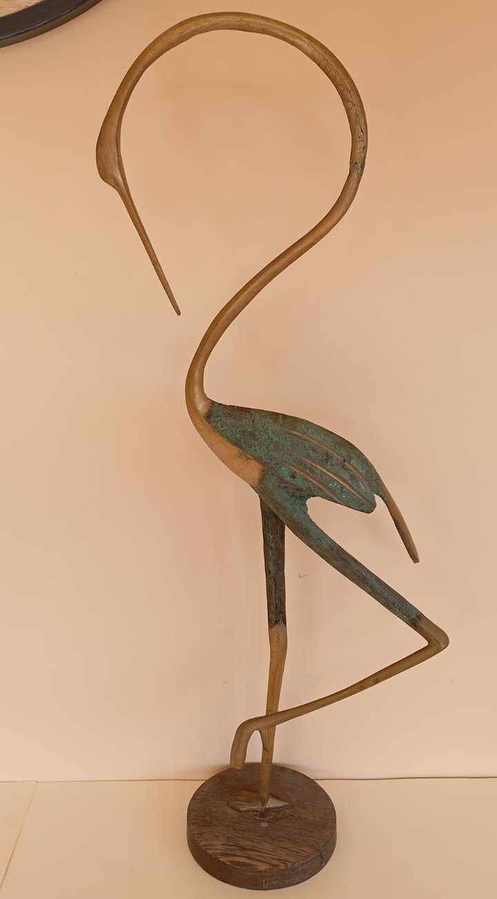 Bronze bird sculpture