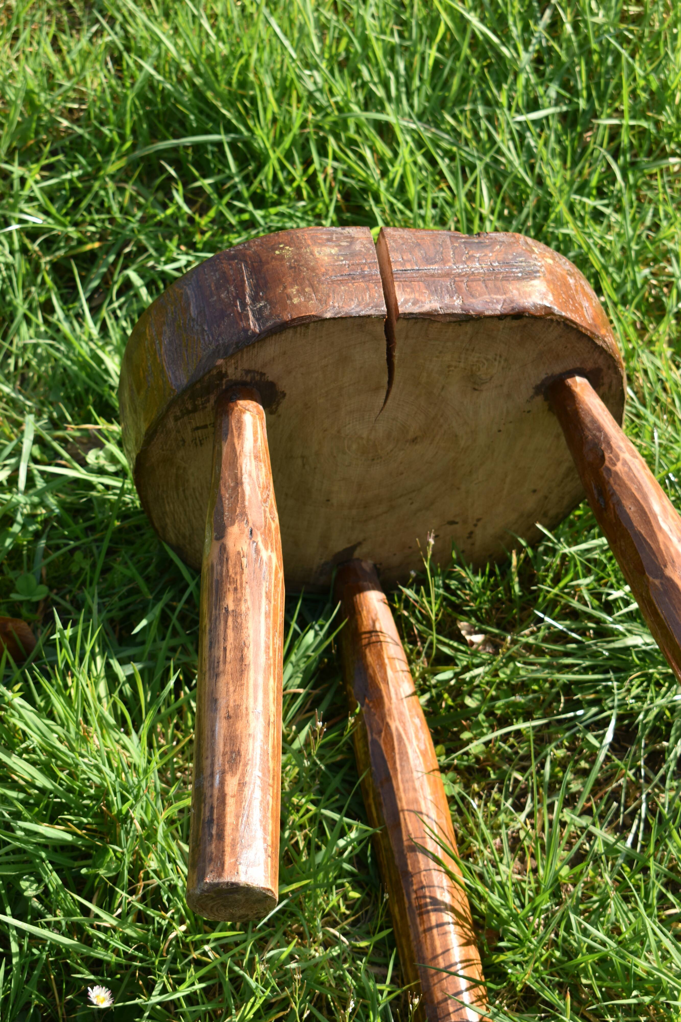 Ancient tripod brutalist stool
