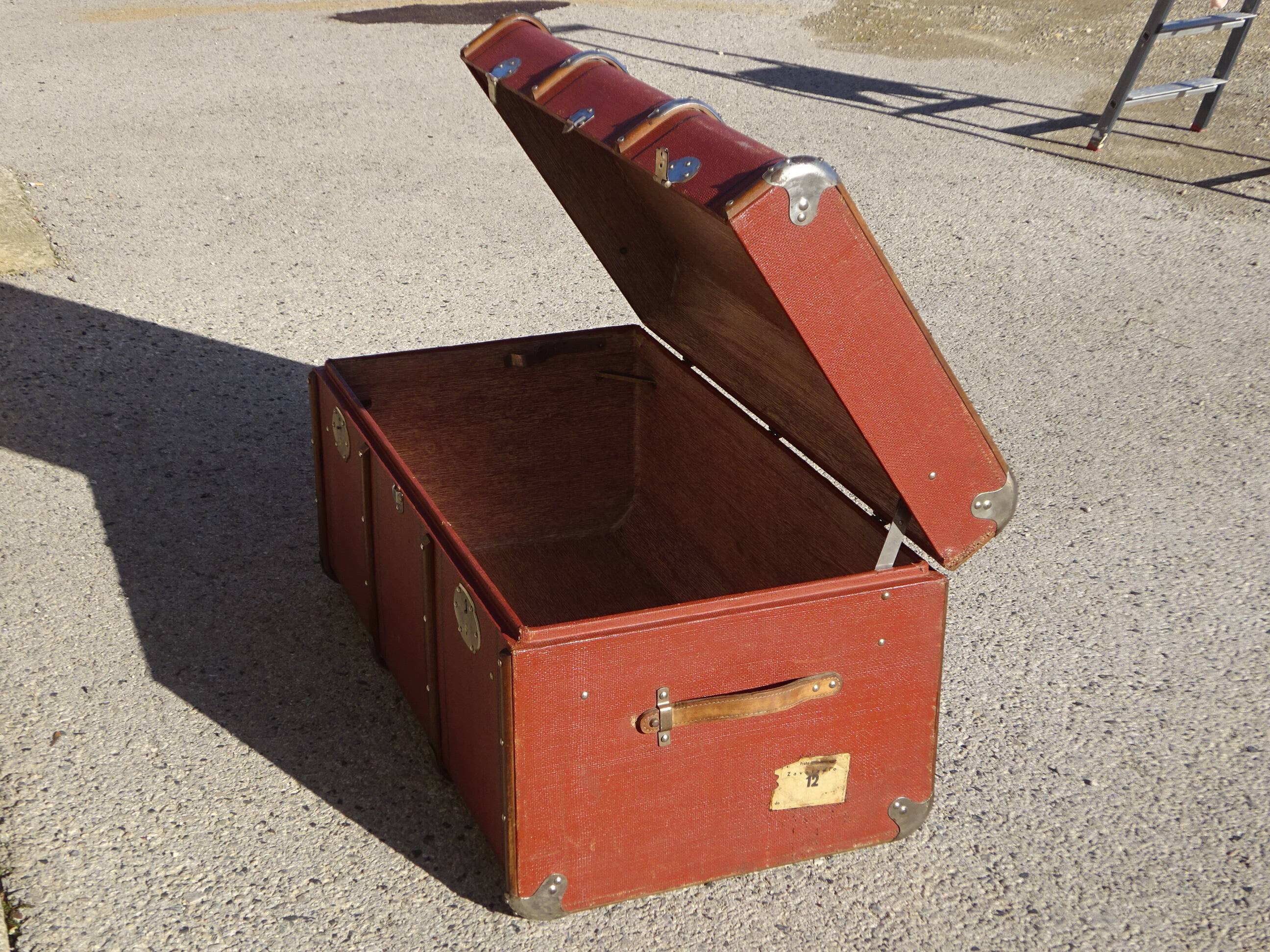 Old curved travel trunk