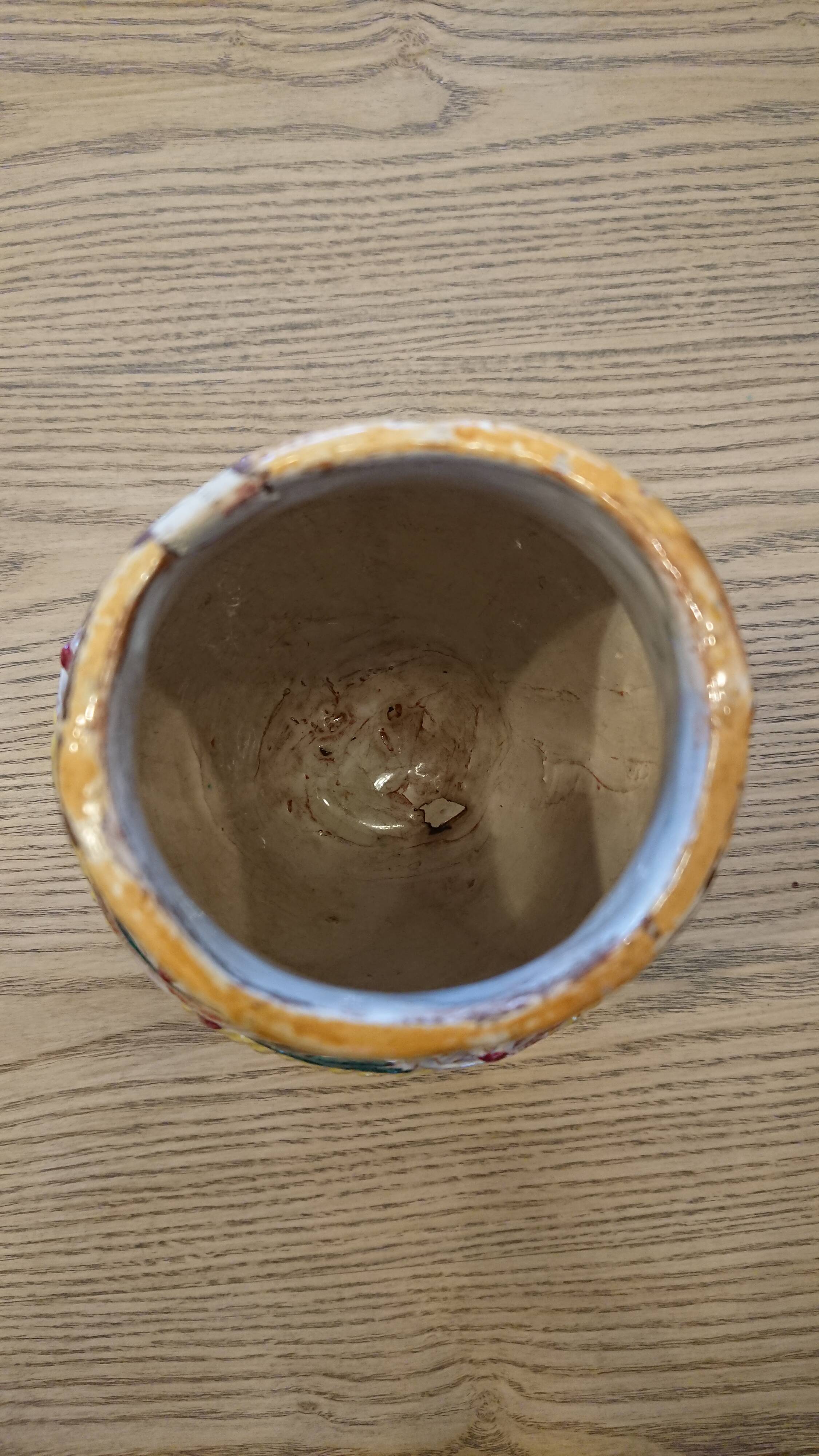 Hand-carved and hand-painted vase