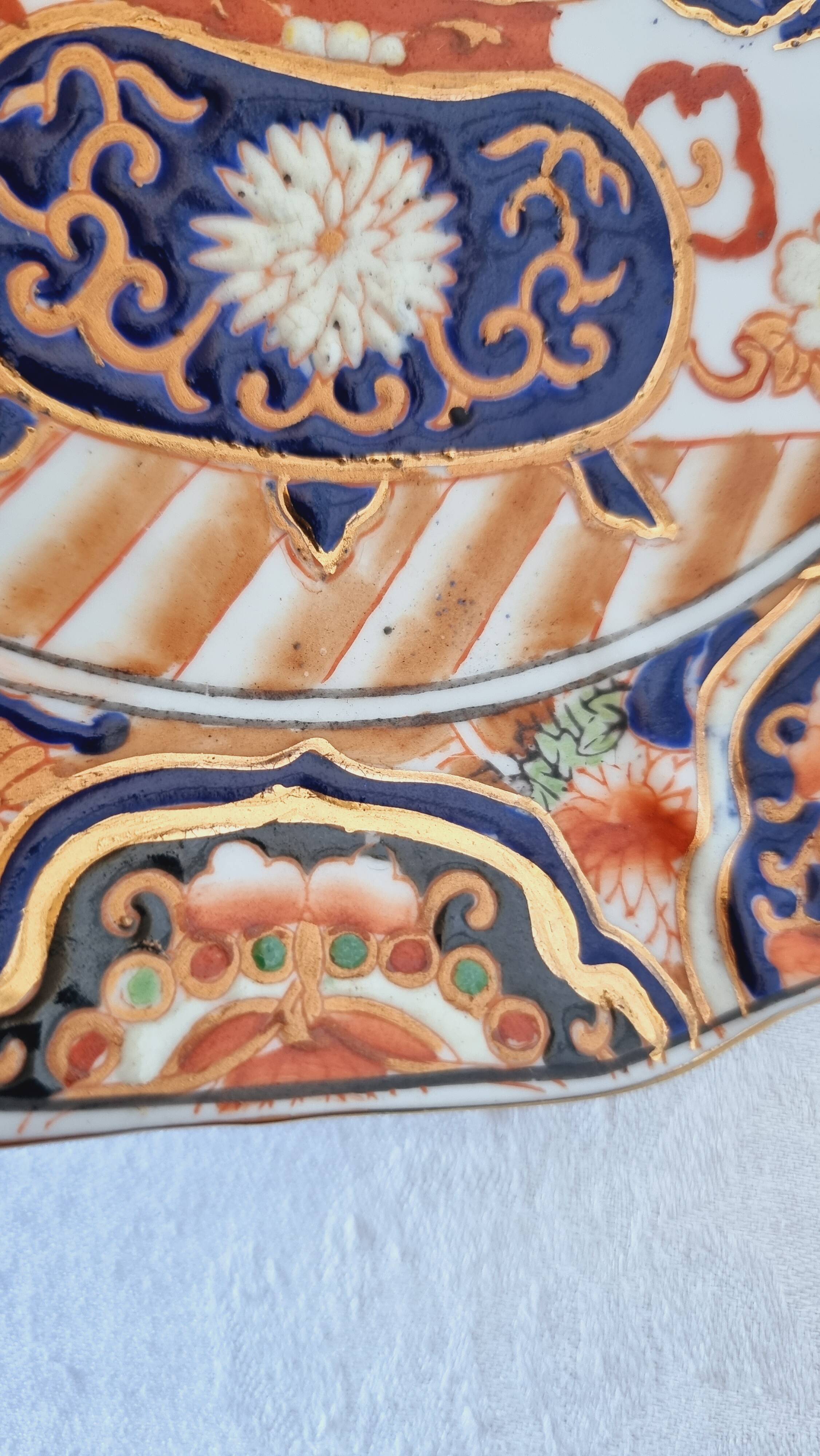 Imari-style porcelain plate, hand-painted, Japan, mid-20th century.