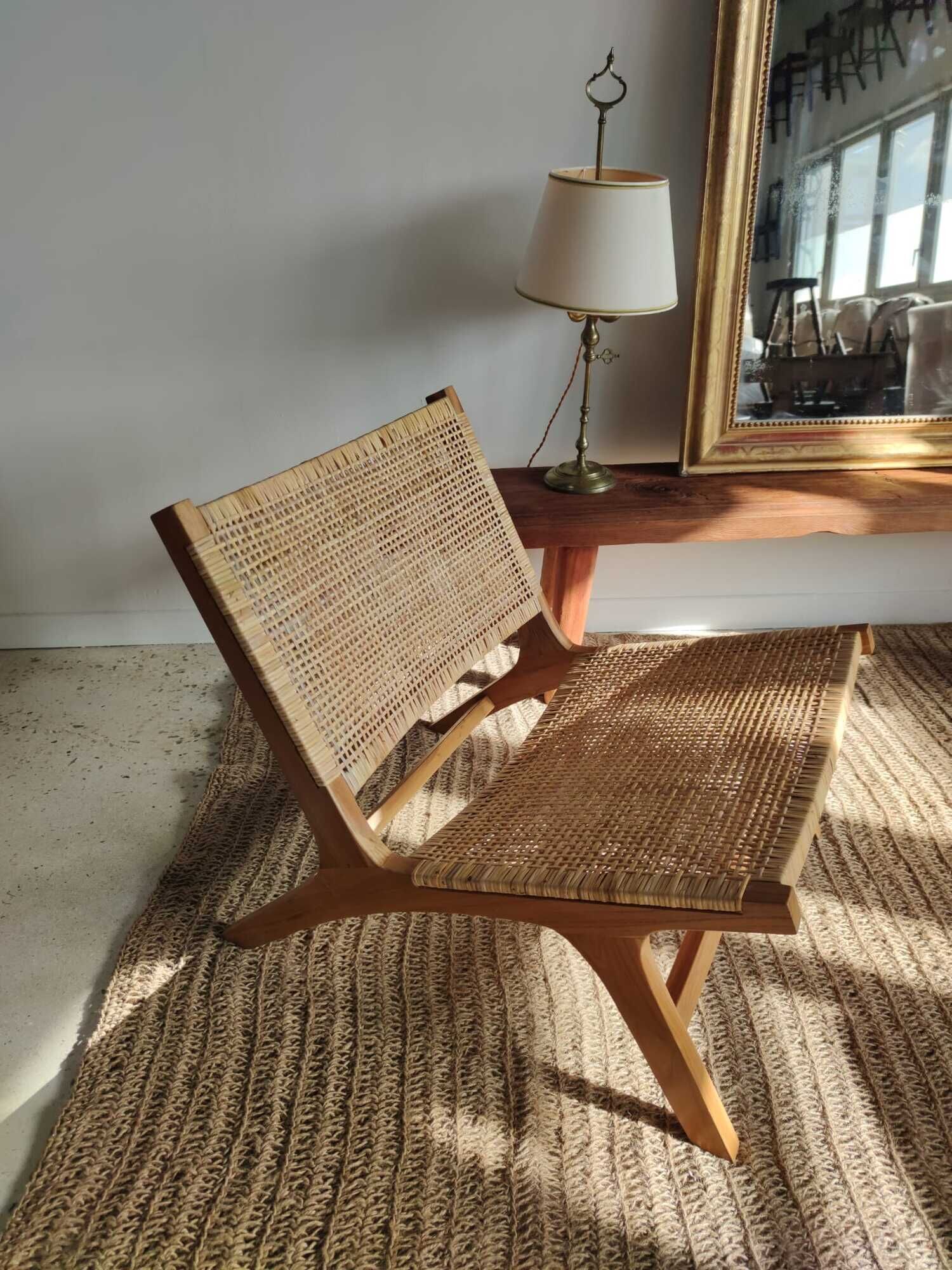 Reclining armchair in natural wood and woven rattan