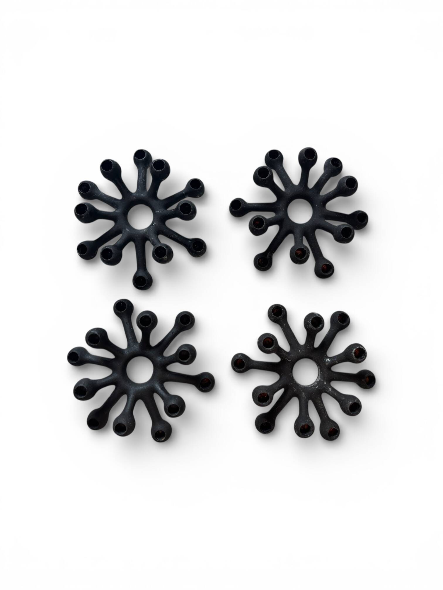 4 "Spider" candle holders by Jens Quistgaard for Dansk Designs, Scandinavian 1960s.